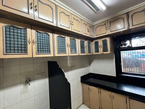 Kitchen in 2 BHK Apartment at Arunoday Tower, Bhandup West – for Sale