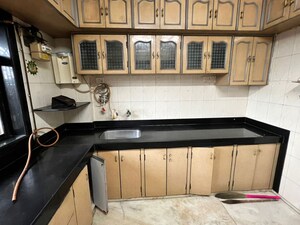 Kitchen in 2 BHK Apartment at Arunoday Tower, Bhandup West – for Sale