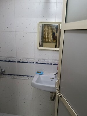 Bathroom in 2 BHK Apartment at Nirman Park, Andheri East – for Rent