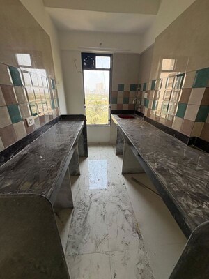 Kitchen in 2 BHK Apartment at Puneet Shivalaya, Tagore Nagar – for Rent