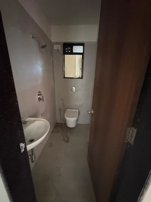 Bathroom in 2 BHK Apartment at Puneet Shivalaya, Tagore Nagar – for Rent