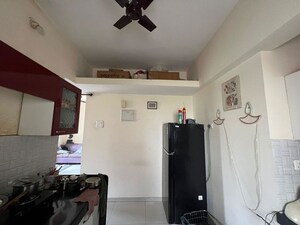 Kitchen in 1 BHK Apartment at Sai Palace CHS, Owale – for Sale