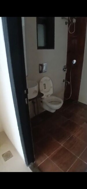 Bathroom in 2 BHK Apartment at Poddar Shri Ganesh Apartment, Goregaon West – for Sale