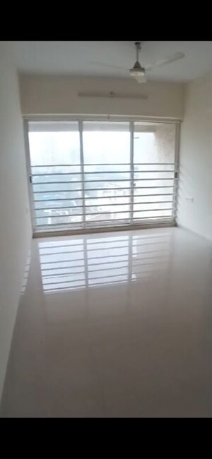 Living Room in 2 BHK Apartment at Poddar Shri Ganesh Apartment, Goregaon West – for Sale