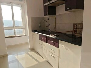 Kitchen in  Apartment at Puranik Rumah Bali, Ghodbunder Road – for Sale