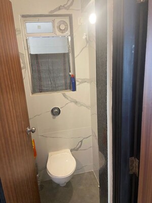 Bathroom in 1 BHK Apartment at Raunak Bliss B1, Ghodbunder Road – for Rent
