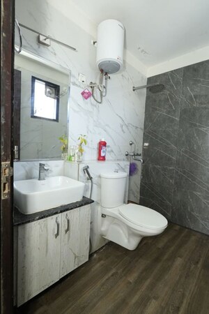 Bathroom in 4 BHK Builder Floor at Unitech South City II, Sector 50 – for Rent