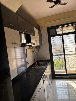 Kitchen in 3 BHK Apartment at Hyde Park CHS, Kharghar – for Rent