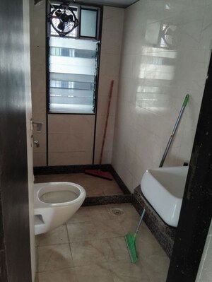 Bathroom in 2 BHK Apartment at MV Labh Samarth Heights, Andheri West – for Sale