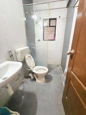 Bathroom in 3 BHK Apartment at Kolte Patil Margosa Heights, Mohammadwadi – for Rent