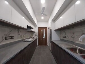 Kitchen in 4 BHK Apartment at DLF Royale Residences, Dlf Phase I – for Sale