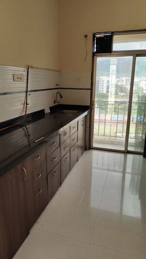 Kitchen in 2 BHK Apartment at Kopar Khairane – for Sale