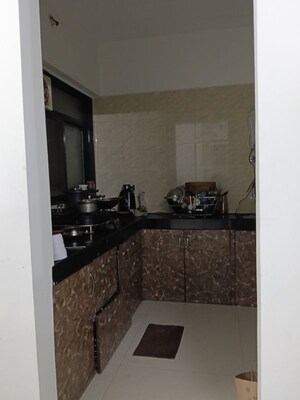 Kitchen in 2 BHK Apartment at Gobind Ganesh Imperia, Wakad – for Rent