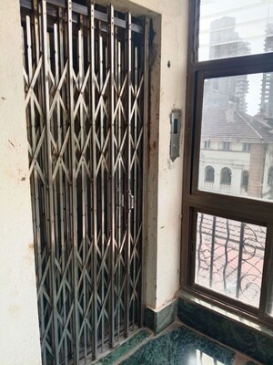 Building Lobby in 2.5 BHK Apartment at Kemps Corner – for Sale