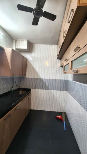Kitchen in 2 BHK Apartment at Chaurang CHS, Sanpada – for Rent