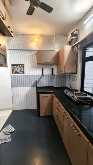 Kitchen in 2 BHK Apartment at Chaurang CHS, Sanpada – for Rent