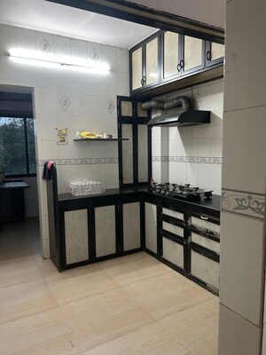 Kitchen in 2 BHK Apartment at Shanti Gardens , Mira Road – for Sale