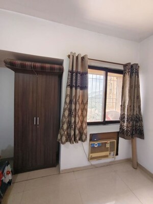 Bedroom in 2 BHK Apartment at Cosmos Jewels, Ghodbunder Road – for Rent