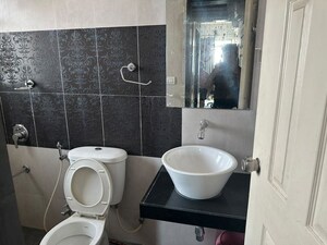 Bathroom in 2 BHK Apartment at Rama Celestial City Phase II, Ravet – for Rent