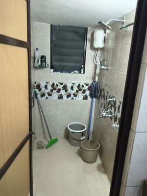 Bathroom in 1 BHK Apartment at Vile Parle East – for Rent