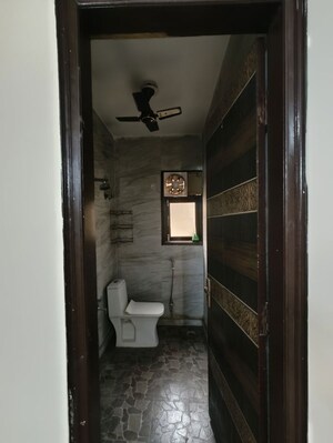 Bathroom in 2 BHK Builder Floor at Chattarpur – for Rent