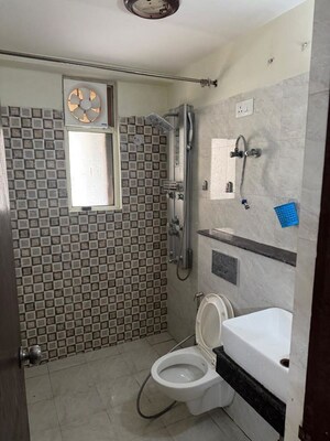 Bathroom in 3 BHK Apartment at JKG Palm Resort, Raj Nagar Extension – for Rent