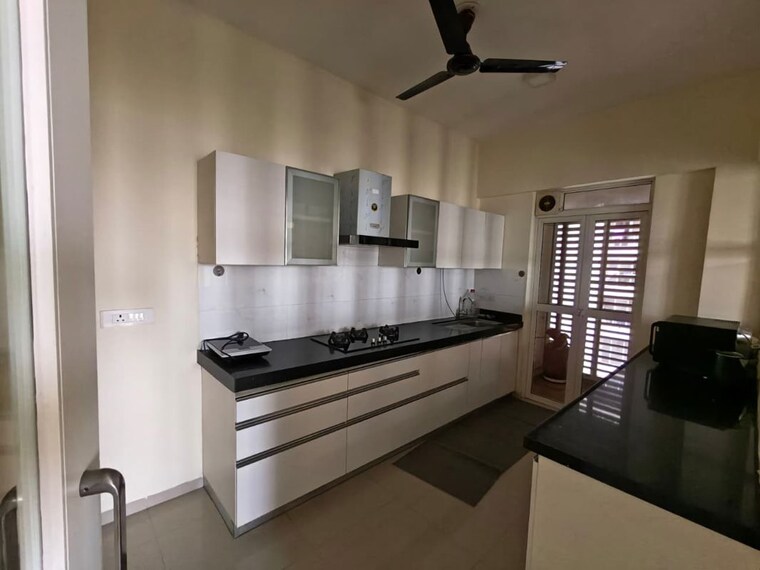 Kitchen, lodha-belmondo 3 Bedroom 2100 Sq.Ft. Apartment In Gahunje Pune 10227677