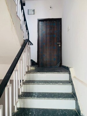 Staircase in 3.5 BHK Apartment at Purvanchal Royal City, Chi V Greater Noida – for Rent