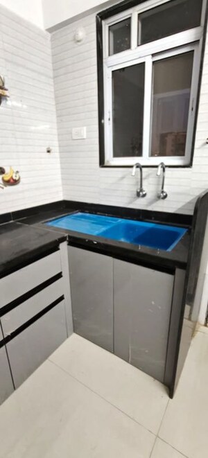 Kitchen in 2 BHK Apartment at Voski Emerald, Kharadi – for Rent