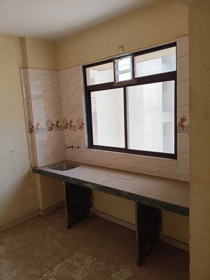 Kitchen in 2 BHK Apartment at Dombivli West – for Sale