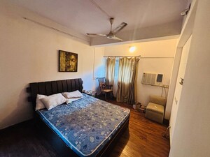 Bedroom in 2 BHK Apartment at Express Apartment, Yari Road – for Rent
