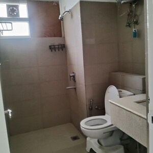 Bathroom in 3.5 BHK Apartment at Emaar MGF The Palm Drive Studios, Sector 66 – for Rent