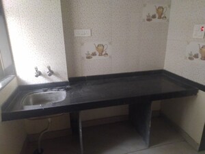 Kitchen in 2 BHK Apartment at Shiva Amrut Estate, Diva – for Rent