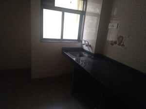 Kitchen in 2 BHK Apartment at Shiva Amrut Estate, Diva – for Rent