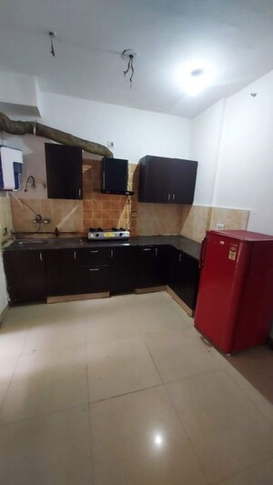 Kitchen in 2.5 BHK Apartment at 3C Lotus Boulevard, Sector 100 – for Rent