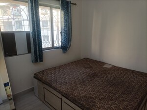 Bedroom in 1 BHK Apartment at Brahmand CHS, Brahmand – for Sale