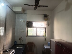 Kitchen in 1 BHK Apartment at Brahmand CHS, Brahmand – for Sale