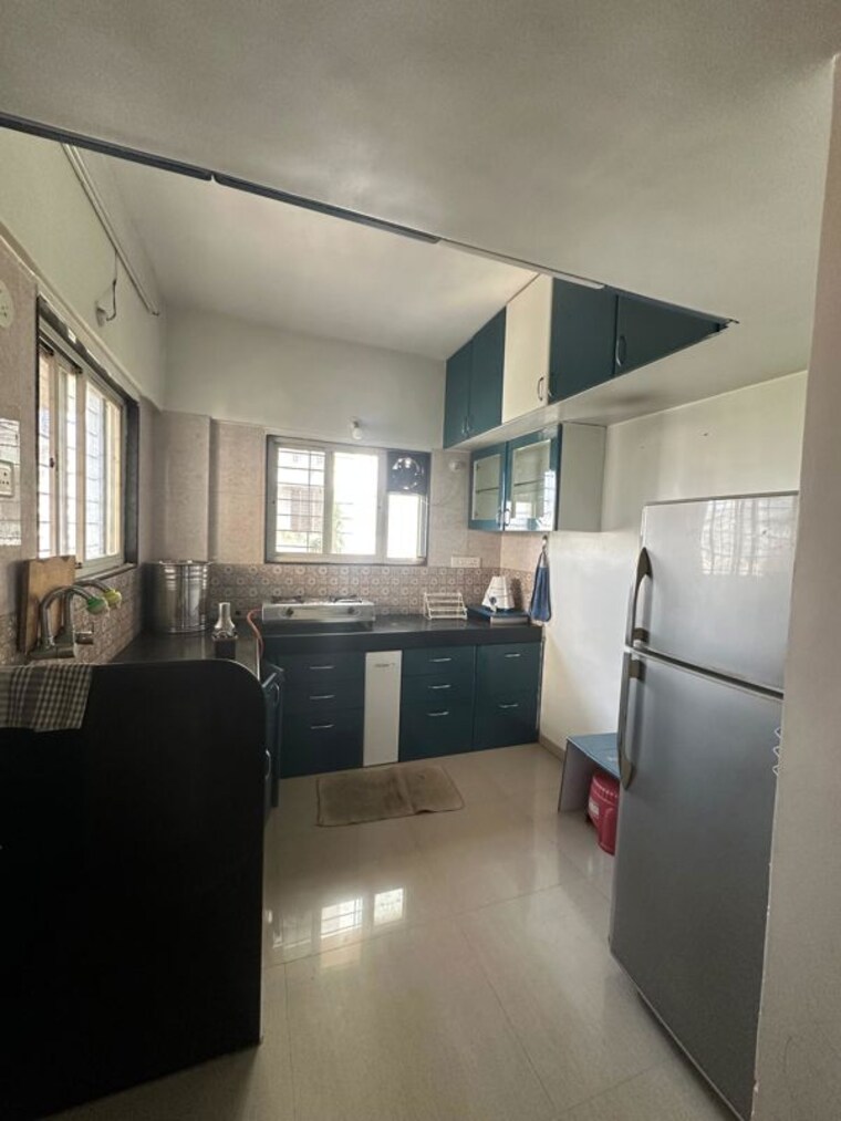 Kitchen, sus 1 Bedroom 670 Sq.Ft. Apartment In Sus Pune 10228075