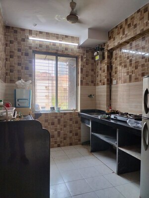 Kitchen in 2 BHK Apartment at Dhanlaxmi CHS Mira Road, Mira Road – for Rent