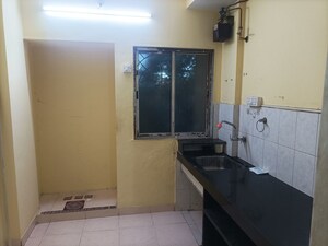 Kitchen in 1 BHK Apartment at New Nandanvan CHS Brahmand, Brahmand – for Sale