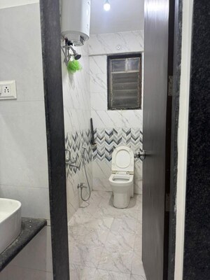 Bathroom in 2 BHK Apartment at Osian Skyra Residency, Balewadi – for Rent