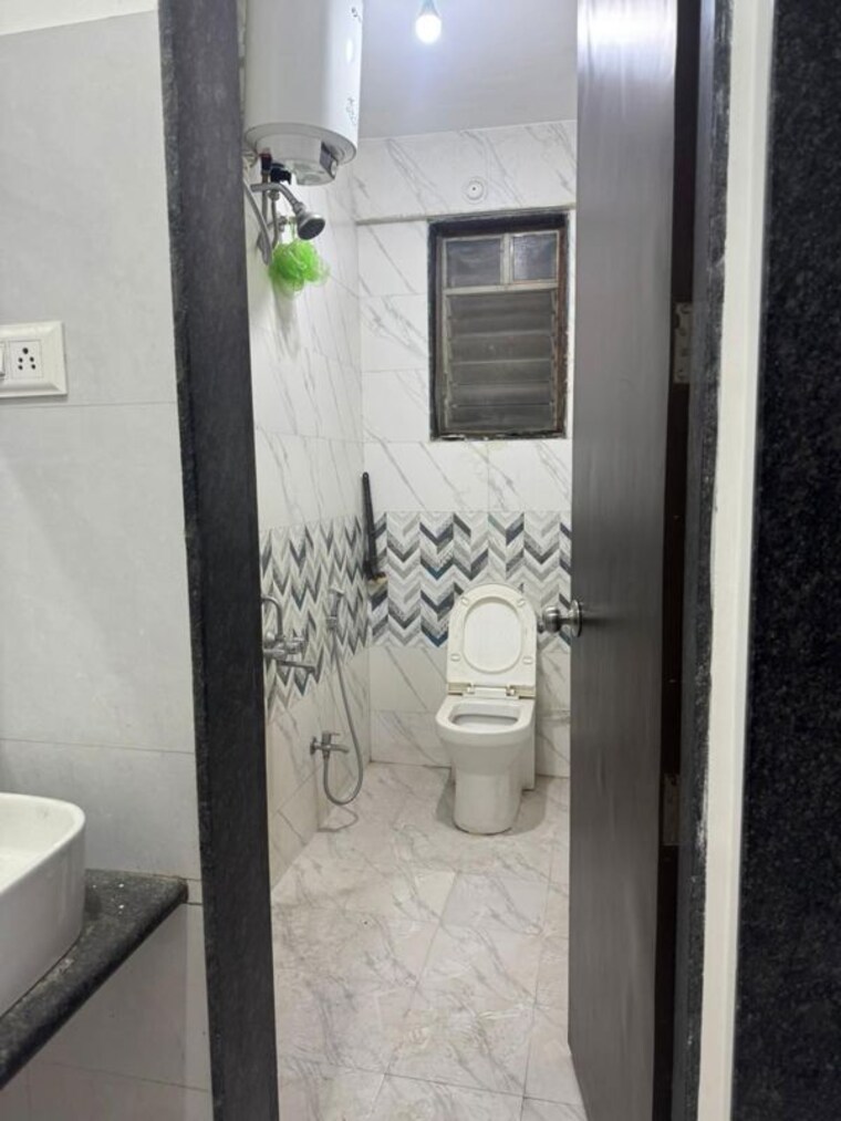 Bathroom, osian-skyra-residency 2 Bedroom 1050 Sq.Ft. Apartment In Balewadi Pune 10228083