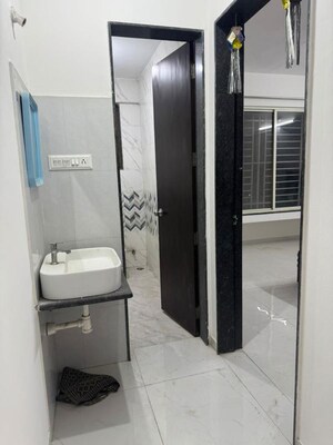 Bathroom in 2 BHK Apartment at Osian Skyra Residency, Balewadi – for Rent