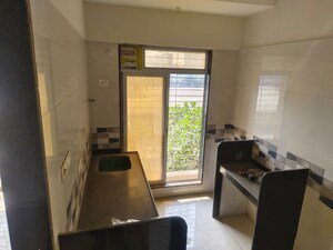 Living Room in 1 BHK Apartment at Re Form Delta House, Goregaon East – for Rent