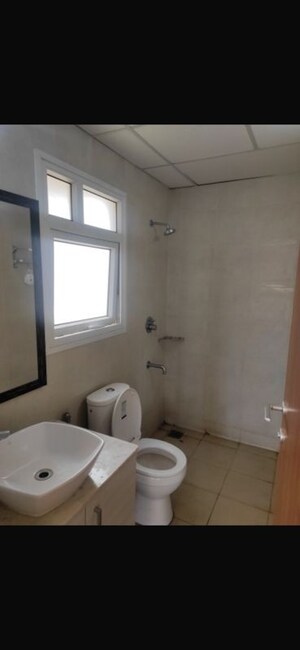 Bathroom in 2 BHK Apartment at Bhartiya Nikoo Homes Phase 2, Thanisandra Main Road – for Sale