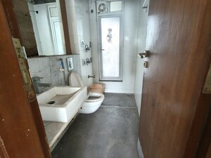 Bathroom in 3 BHK Apartment at The Wadhwa Palm Beach Residency, Nerul Sector 4 – for Sale