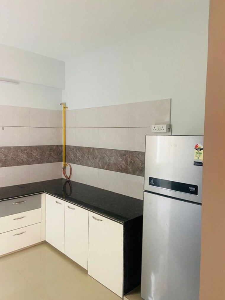Kitchen, aaryan-gloria 3 Bedroom 1500 Sq.Ft. Apartment In South Bopal Ahmedabad 10228266