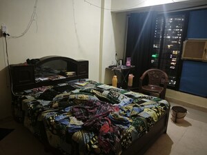 Bedroom in 2 BHK Apartment at Divya Stuti CHS, Goregaon East – for Rent
