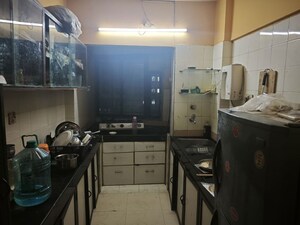 Kitchen in 2 BHK Apartment at Divya Stuti CHS, Goregaon East – for Rent