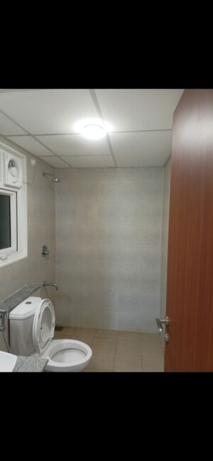 Bathroom in 2 BHK Apartment at Bhartiya City Nikoo Homes II, Thanisandra Main Road – for Rent